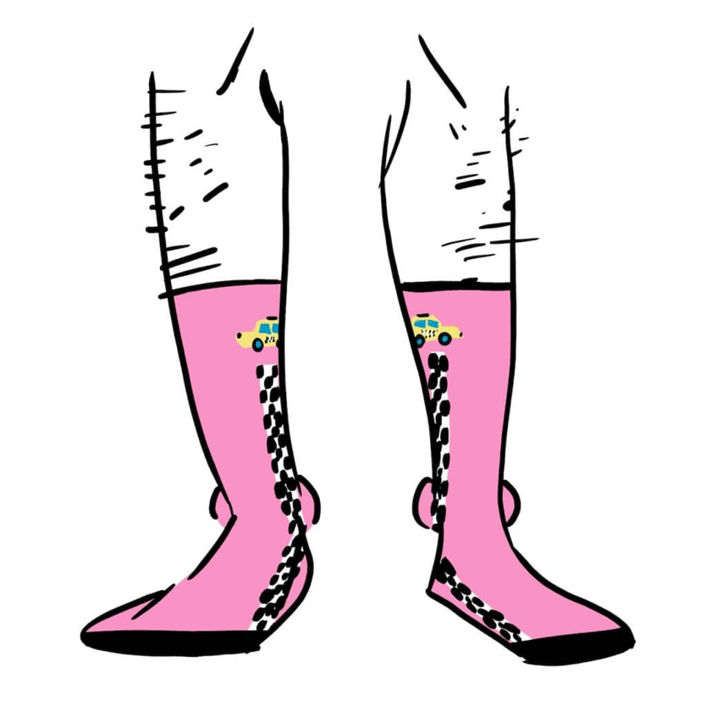 Pink socks with a small taxi cab and a black and white checker line.