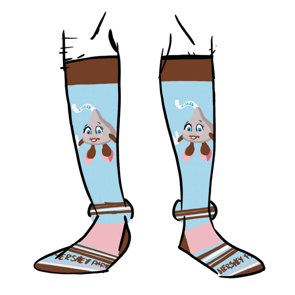 Socks with a Hershey Kiss wearing pink shoes. The socks are bright blue with brown stripes and big pink stripes. On the toes it says Hershey Park.